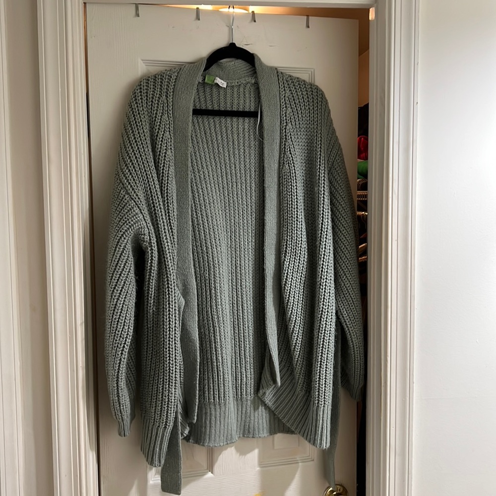 Green crochet sweater.
